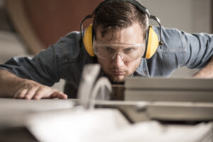Saw operator preparing ideal board